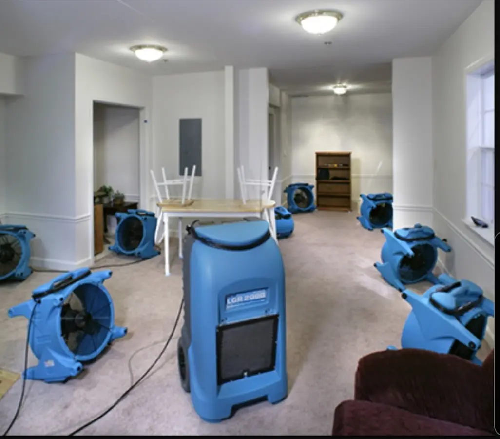 Air movers and dehumidifier setup for Water Damage Restoration in South Kensington
